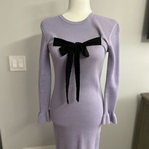 Dress with bow detail and wrist detail